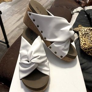 Cheerful white wedges by Corky’s . Size 7. Brand new, never worn.